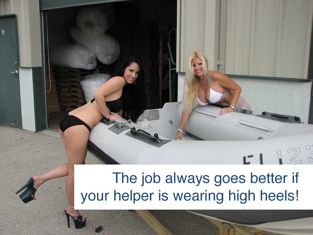 women posing with inflatable boat restored to like-new condition using inland marine inflatable boat repair products